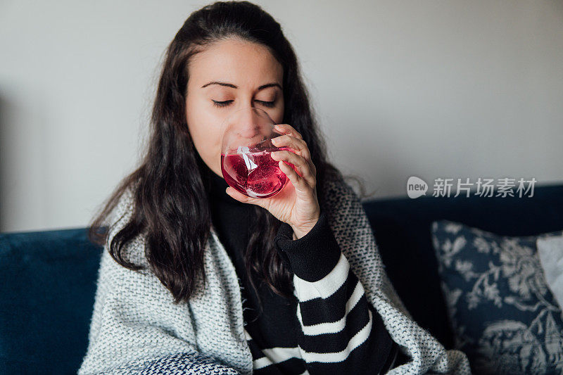 Sick woman taking effervescent tablets for getting better